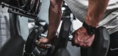 What is The Best Rep Range and Number of Sets for Building Muscl
